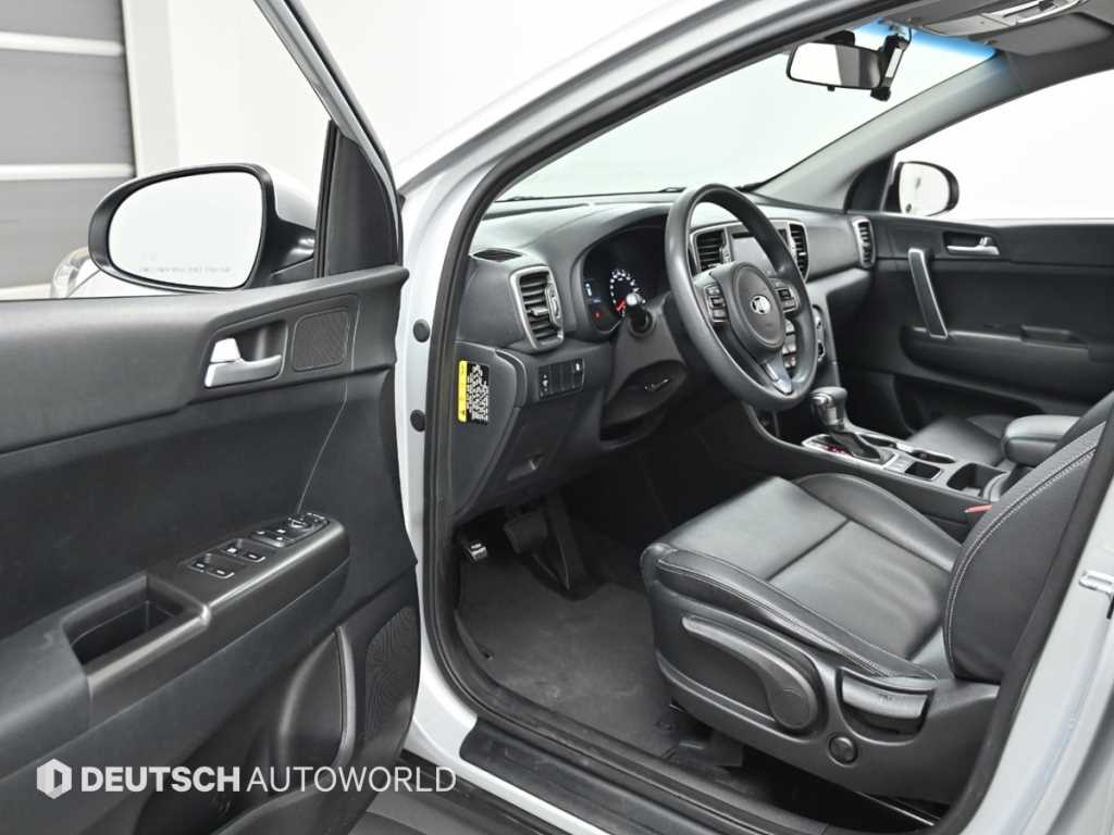 Kia Sportage — photo 11
