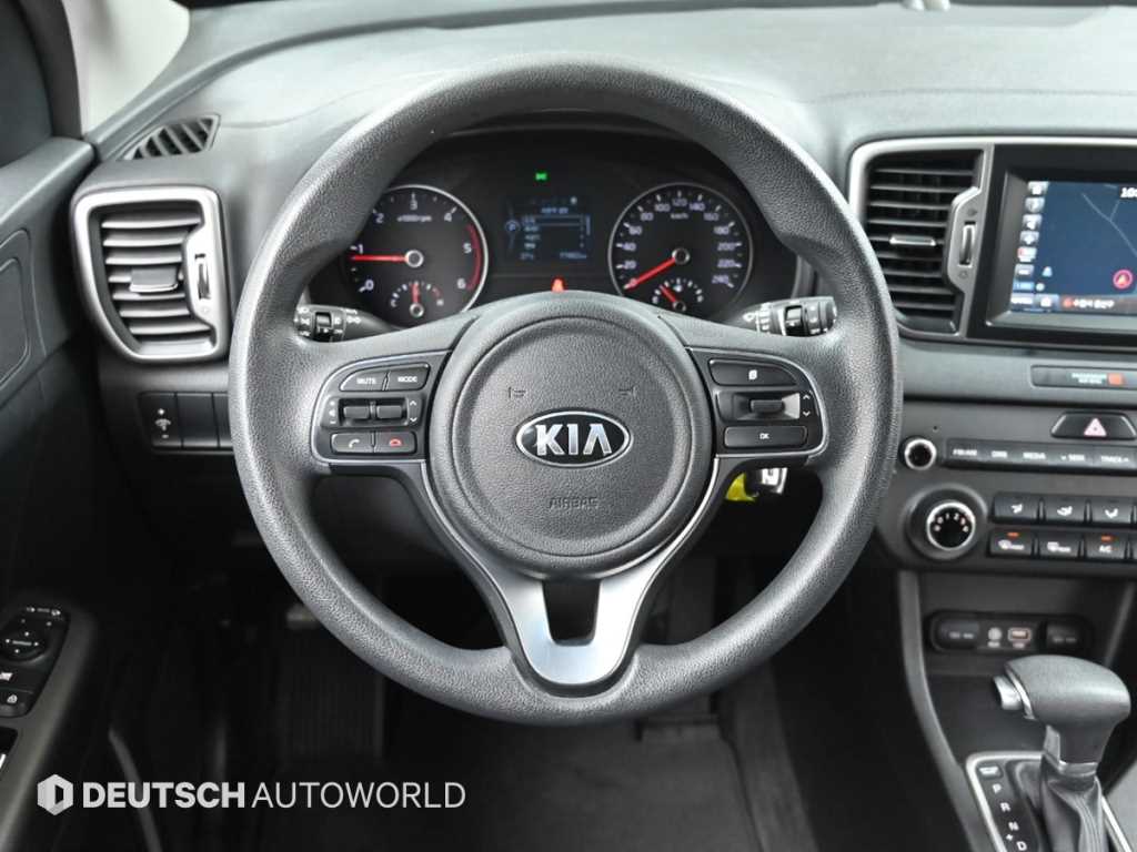 Kia Sportage — photo 13