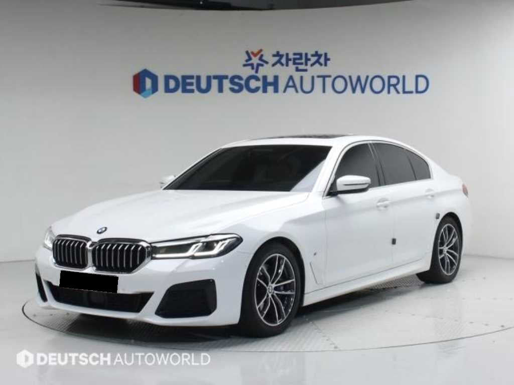 BMW 5-Series — photo 01