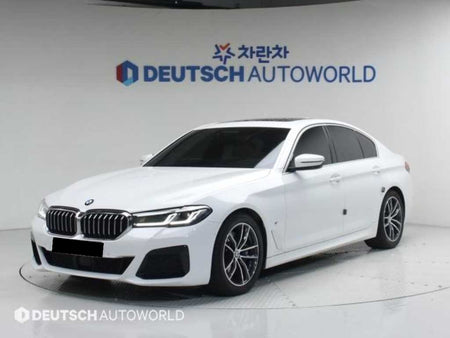 BMW 5-Series — photo 01