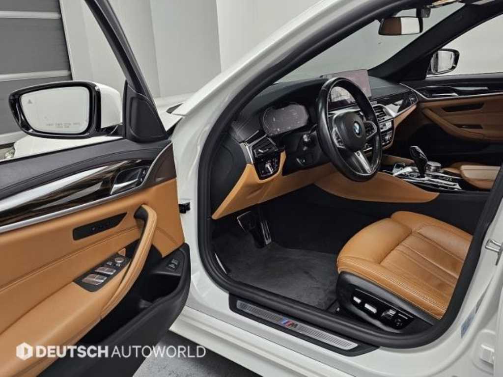 BMW 5-Series — photo 11