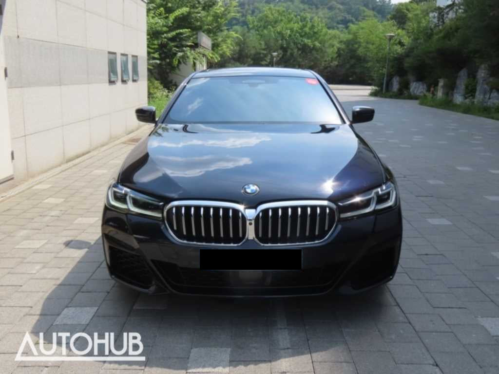 BMW 5-Series — photo 01