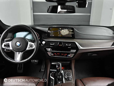 BMW 5-Series — photo 01