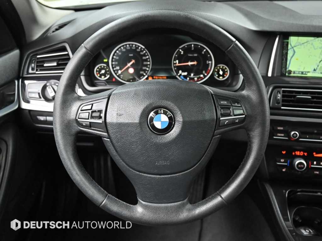 BMW 5-Series — photo 14
