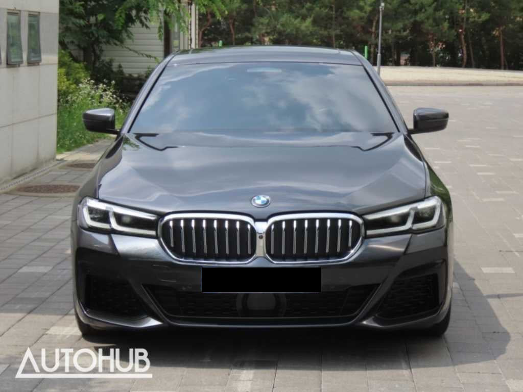 BMW 5-Series — photo 01