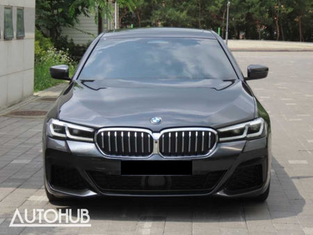 BMW 5-Series — photo 01