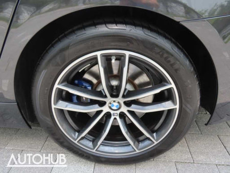 BMW 5-Series — photo 18