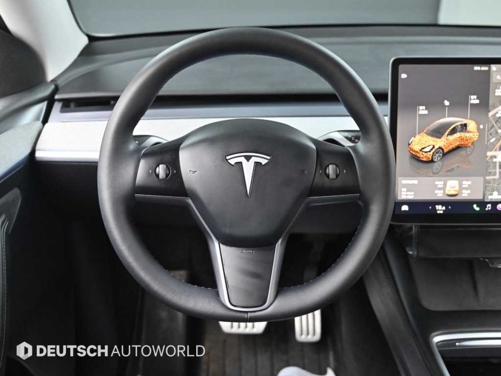Tesla Model Y — photo 13