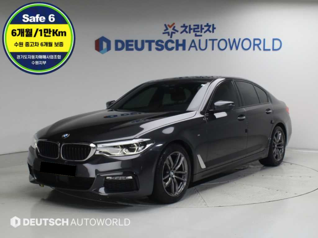 BMW 5-Series — photo 01