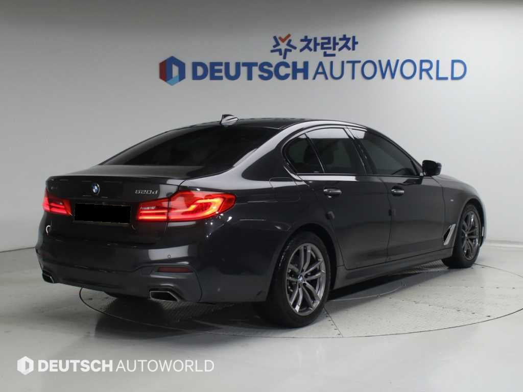 BMW 5-Series — photo 02