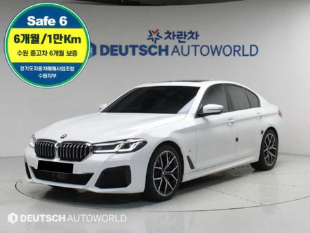 BMW 5-Series — photo 01
