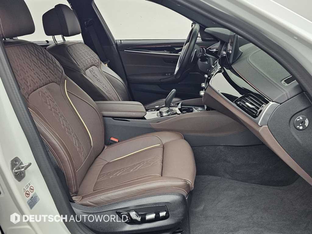 BMW 5-Series — photo 10