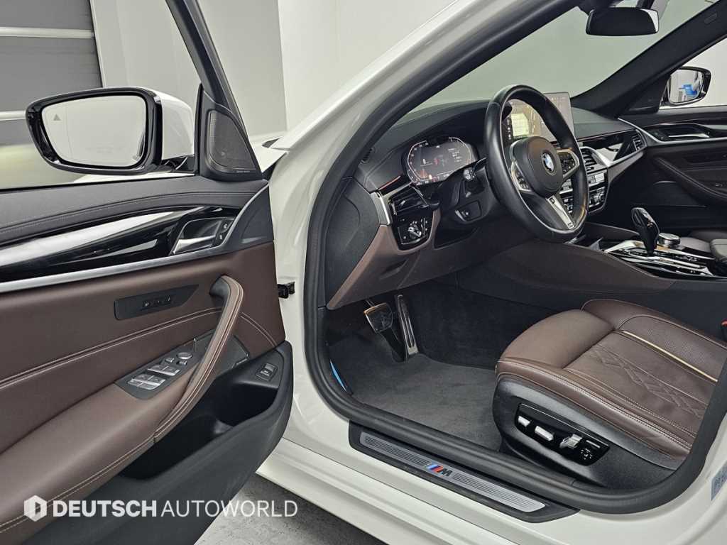 BMW 5-Series — photo 11