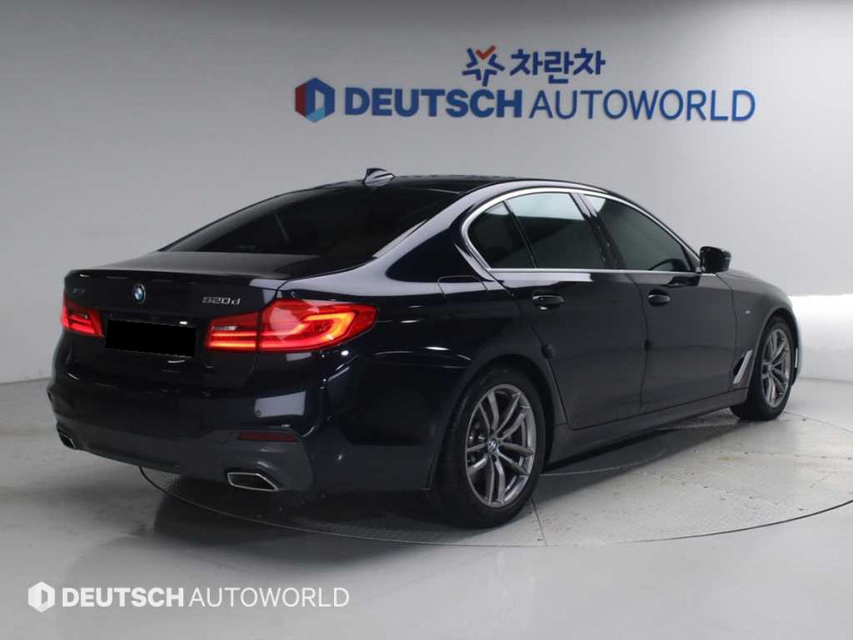 BMW 5-Series — photo 02