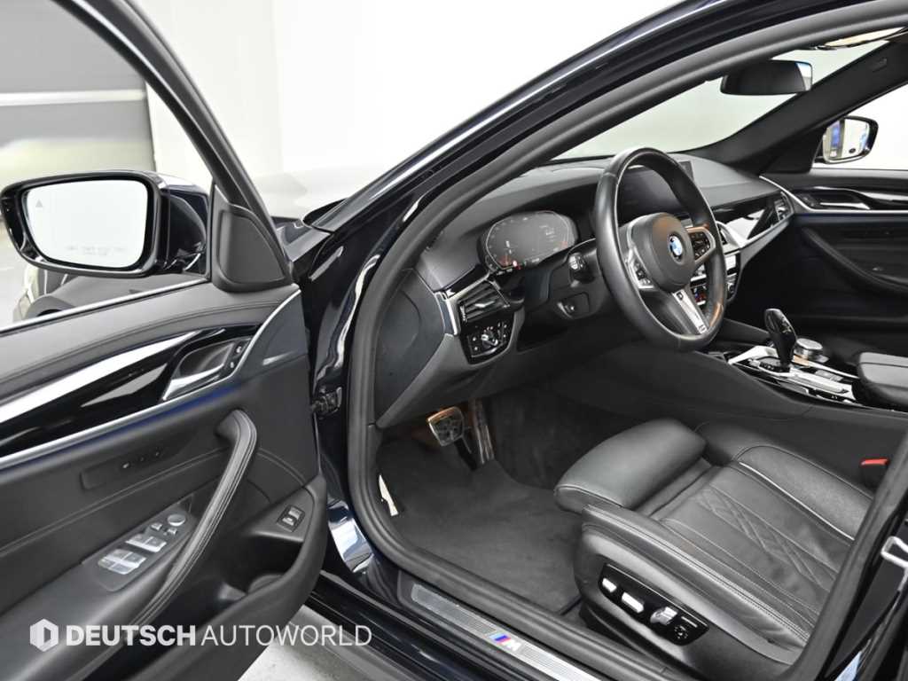 BMW 5-Series — photo 11