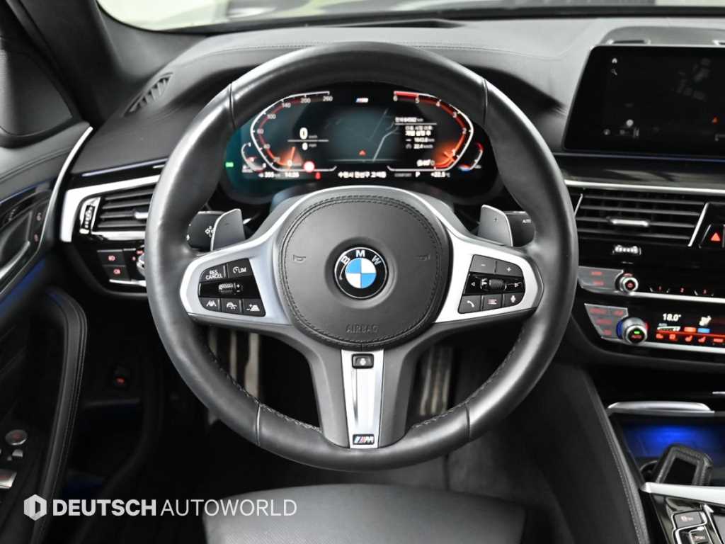 BMW 5-Series — photo 13