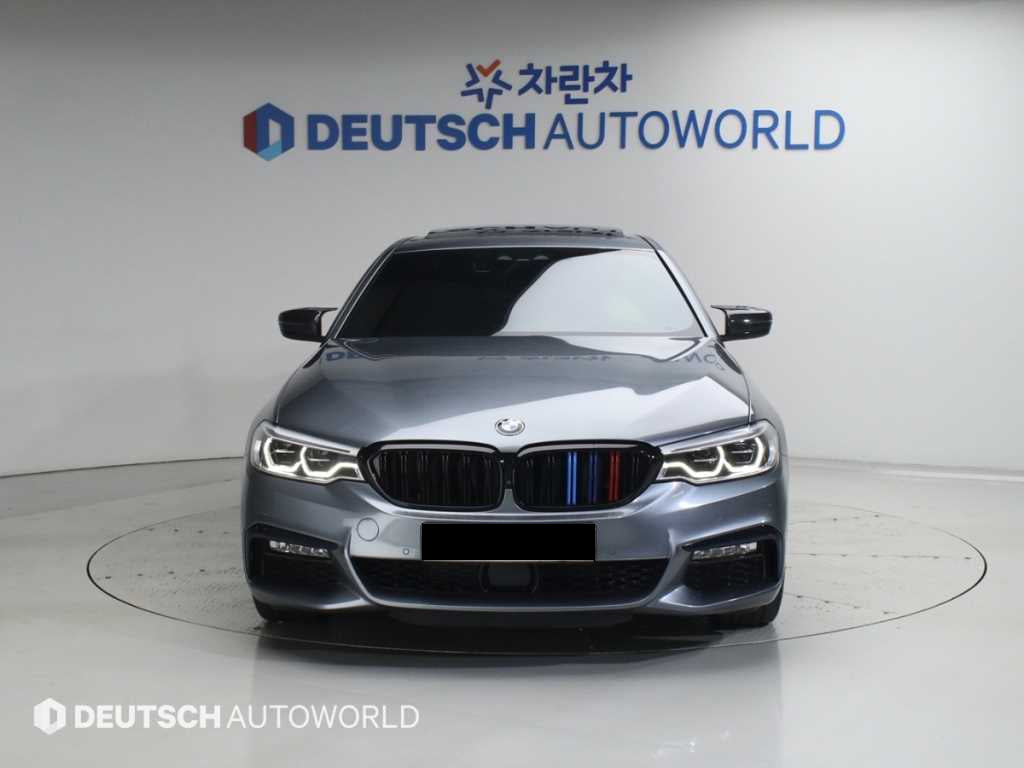 BMW 5-Series — photo 01