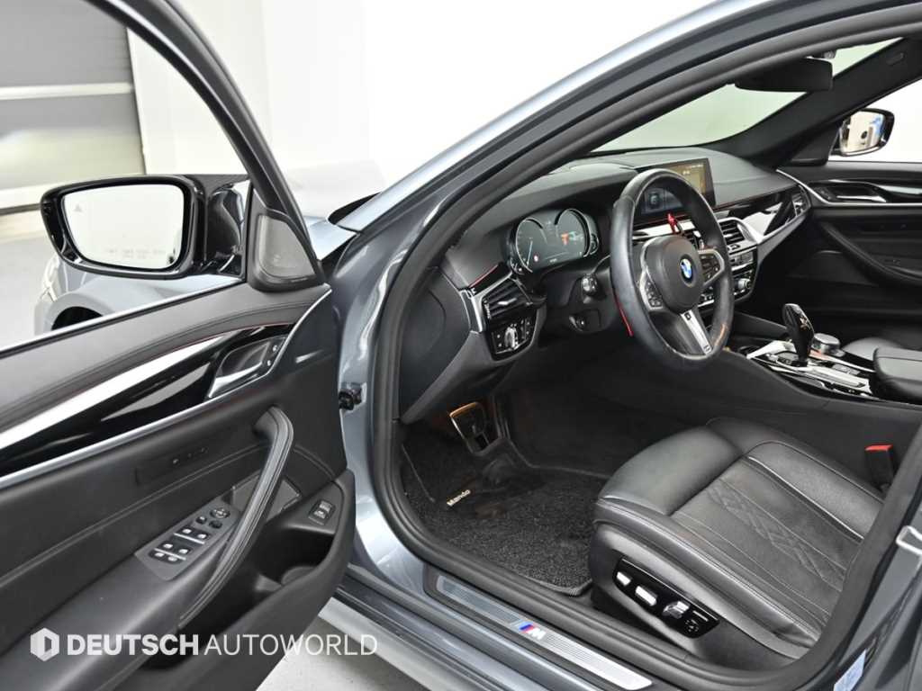 BMW 5-Series — photo 11
