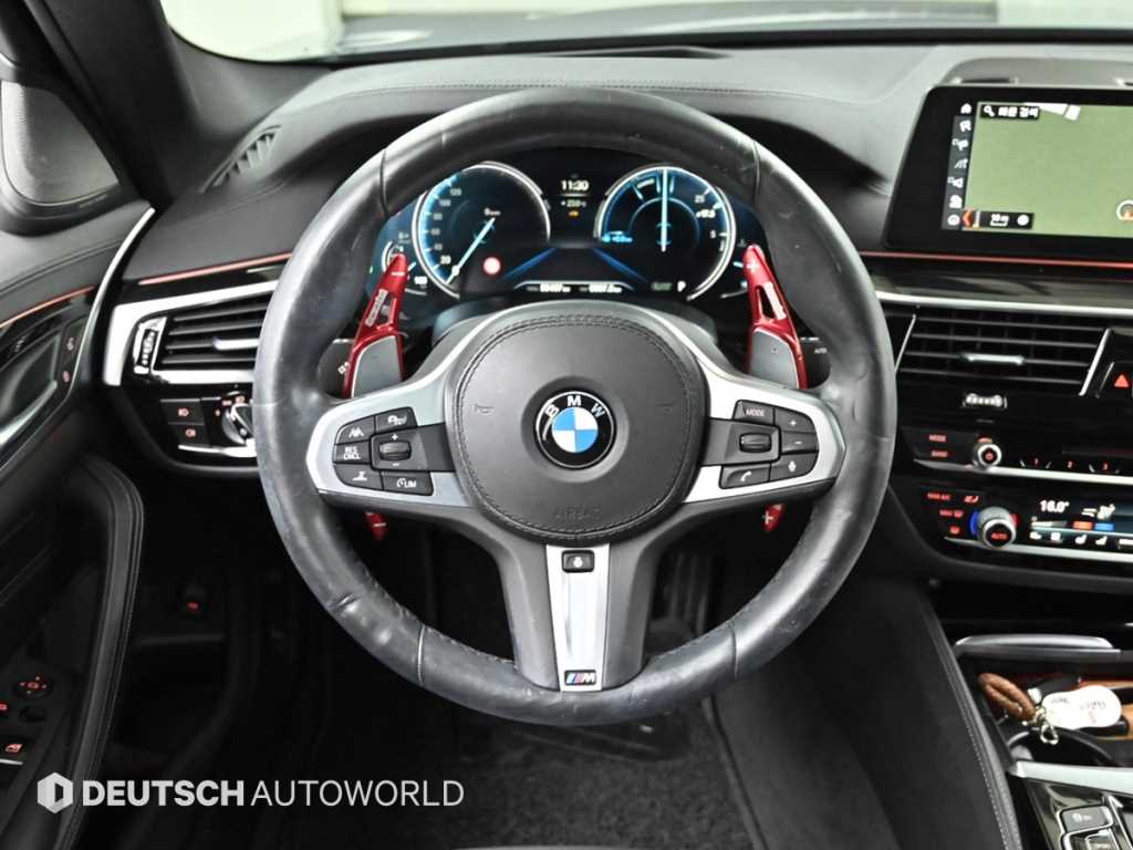 BMW 5-Series — photo 13