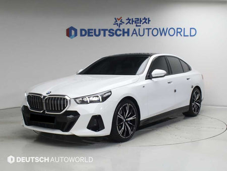 BMW 5-Series — photo 01