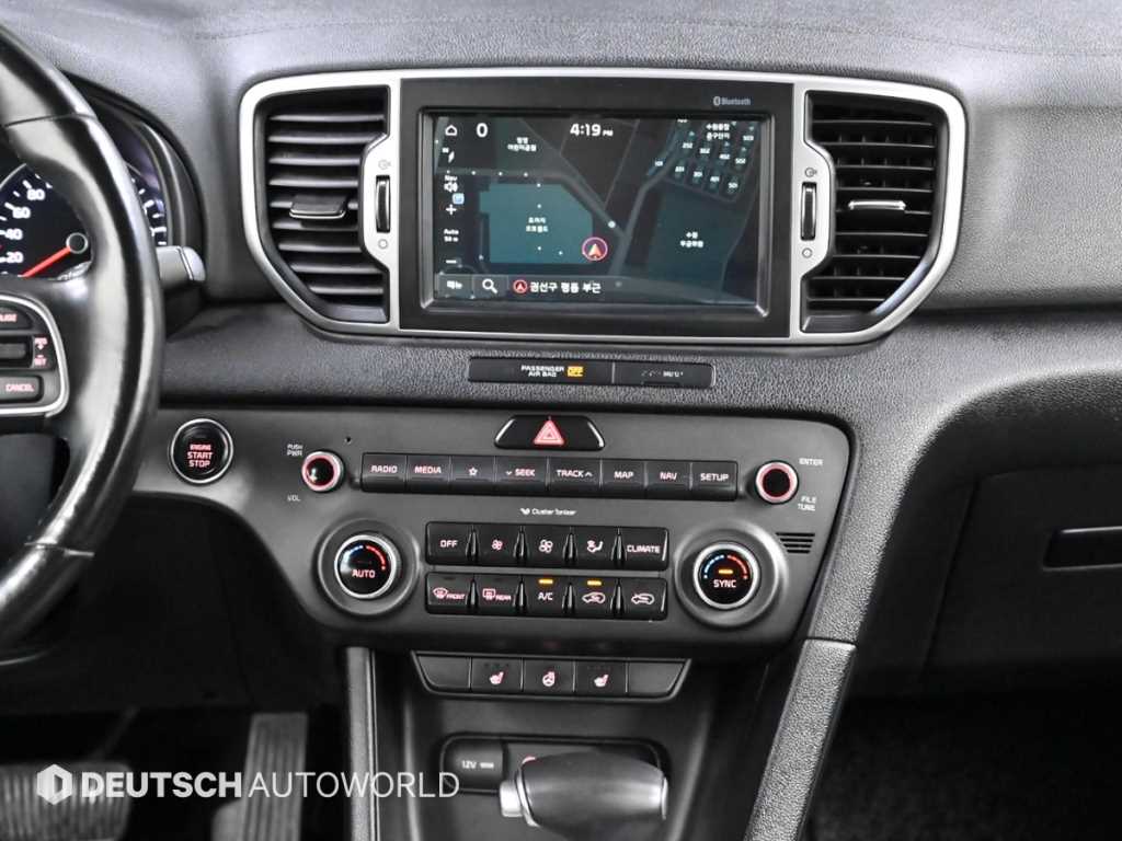 Kia Sportage — photo 14