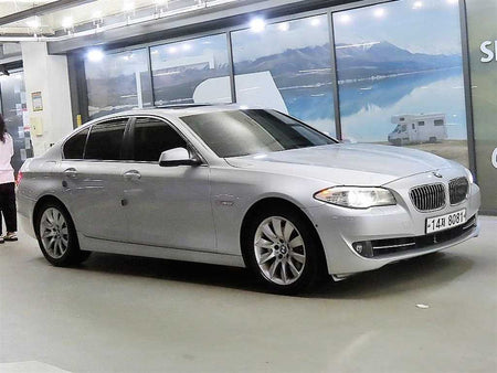 BMW 5-Series — photo 01