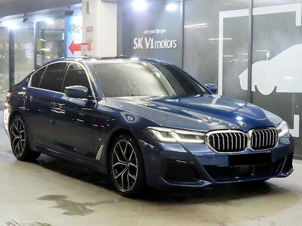 BMW 5-Series — photo 01
