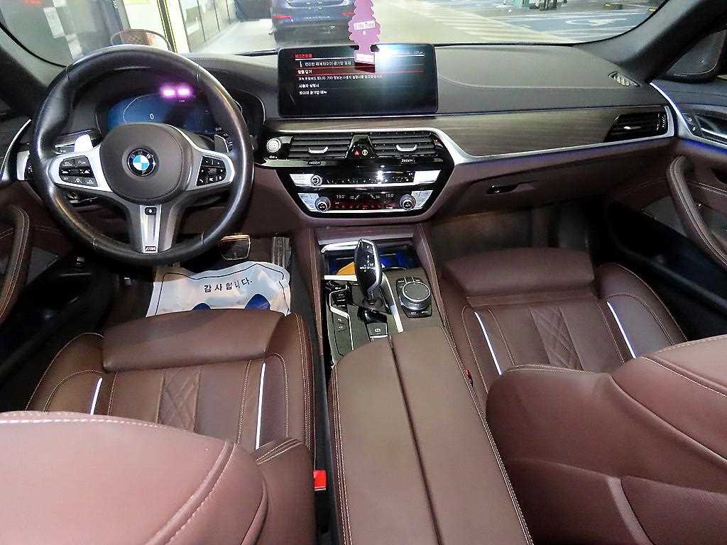 BMW 5-Series — photo 10