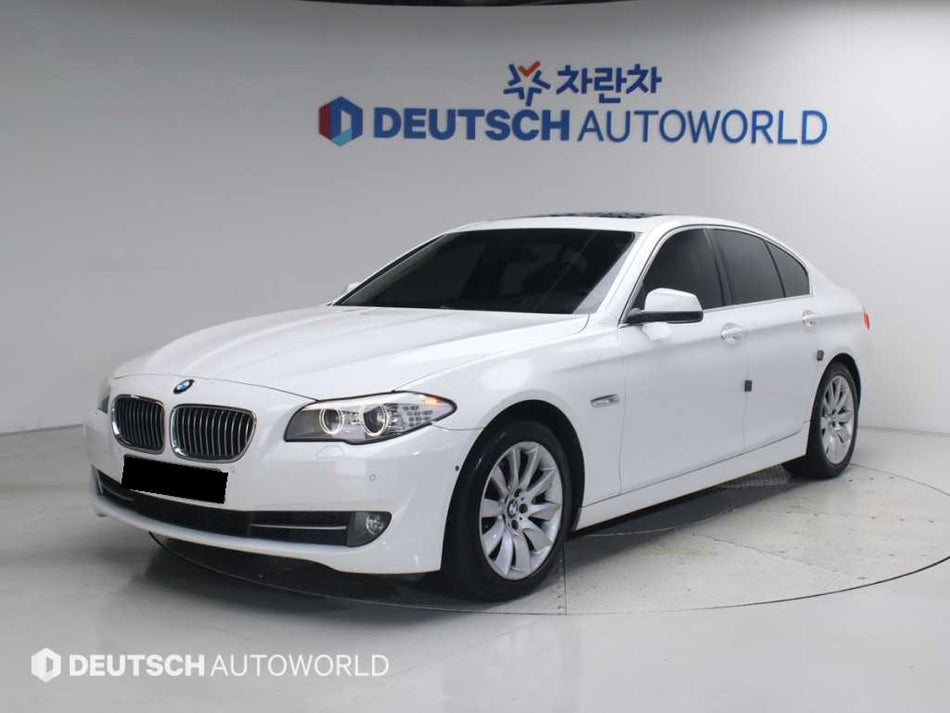 BMW 5-Series — photo 01