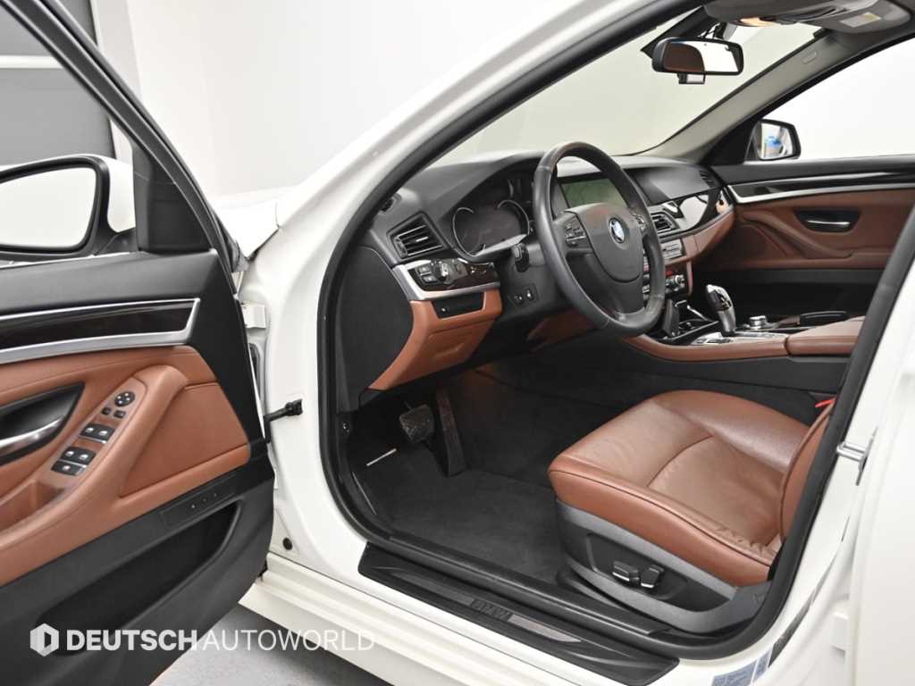 BMW 5-Series — photo 11