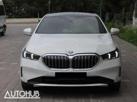BMW 5-Series — photo 01