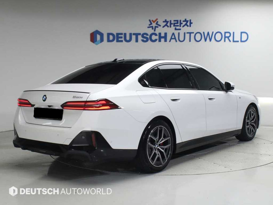 BMW 5-Series — photo 02