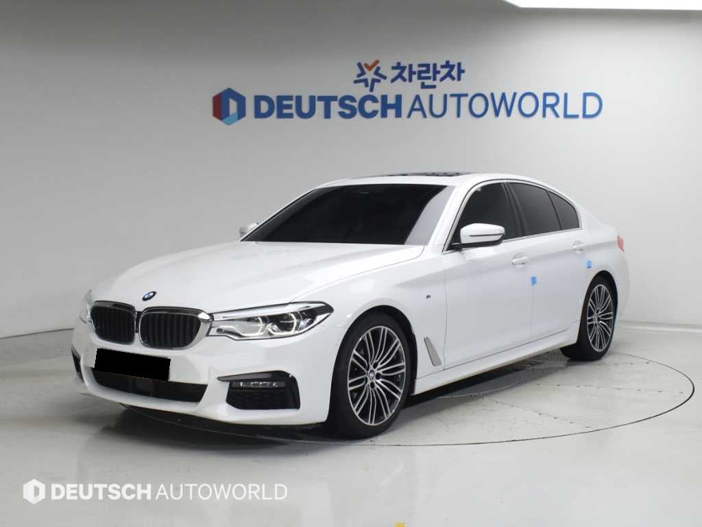 BMW 5-Series — photo 01