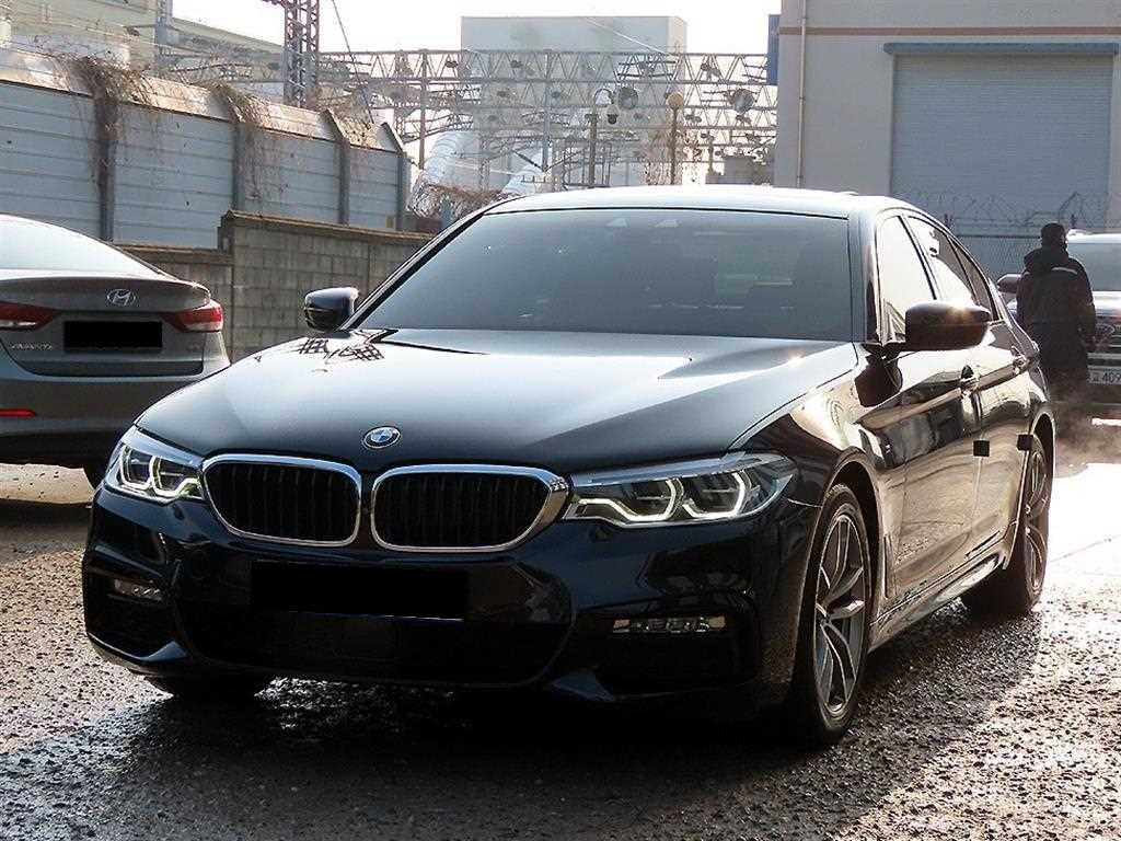 BMW 5-Series — photo 02