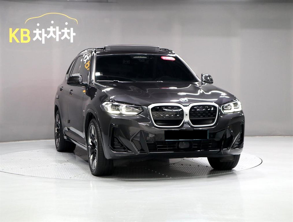 BMW iX3 — photo 02