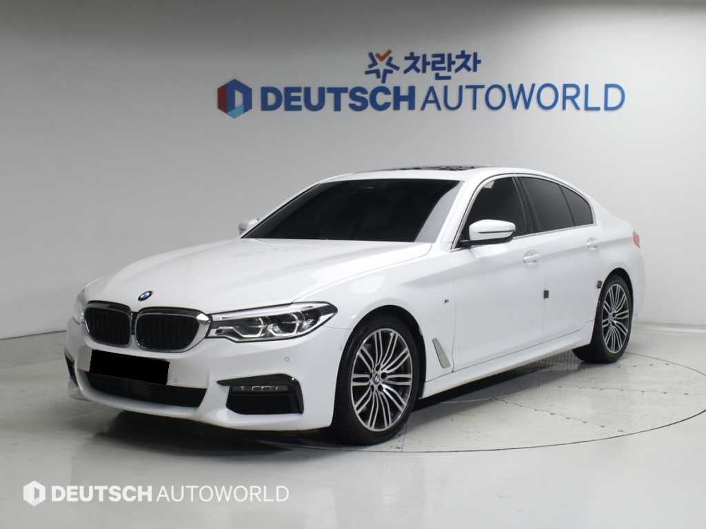 BMW 5-Series — photo 01