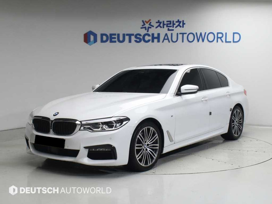 BMW 5-Series — photo 01