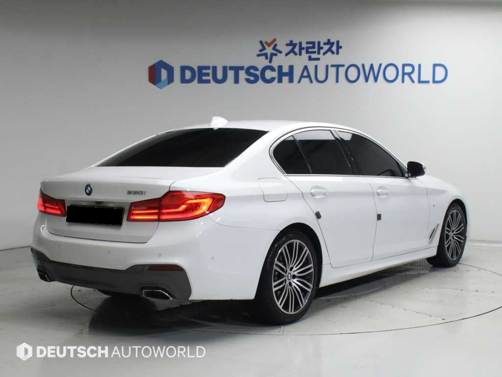 BMW 5-Series — photo 02