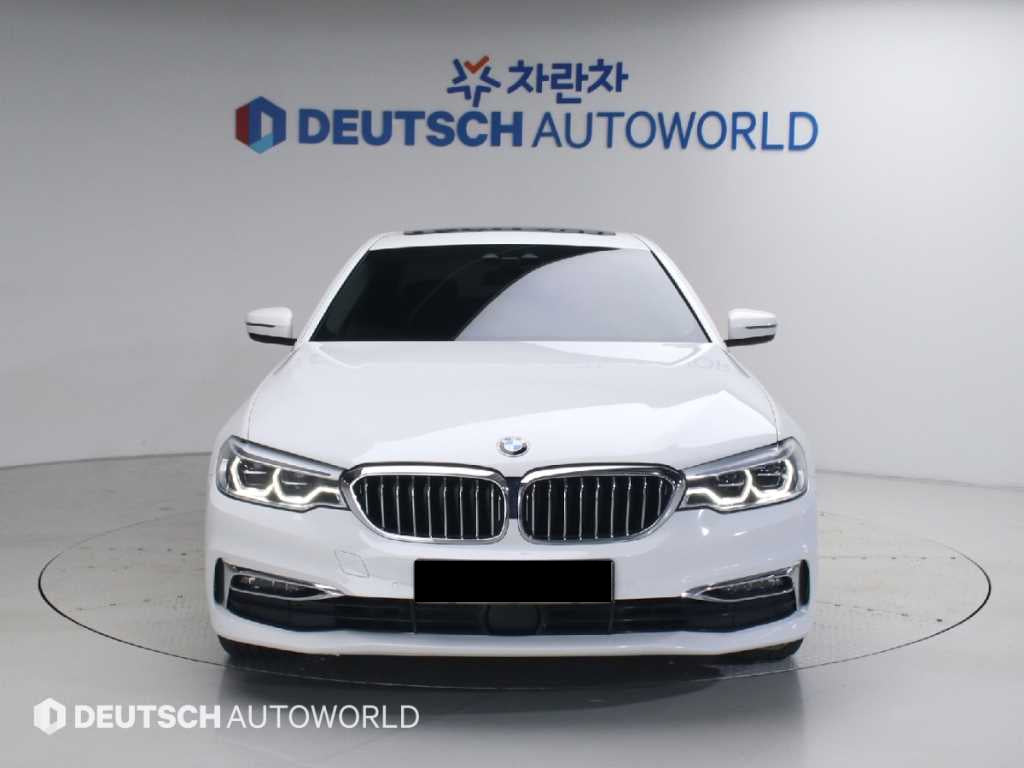 BMW 5-Series — photo 01