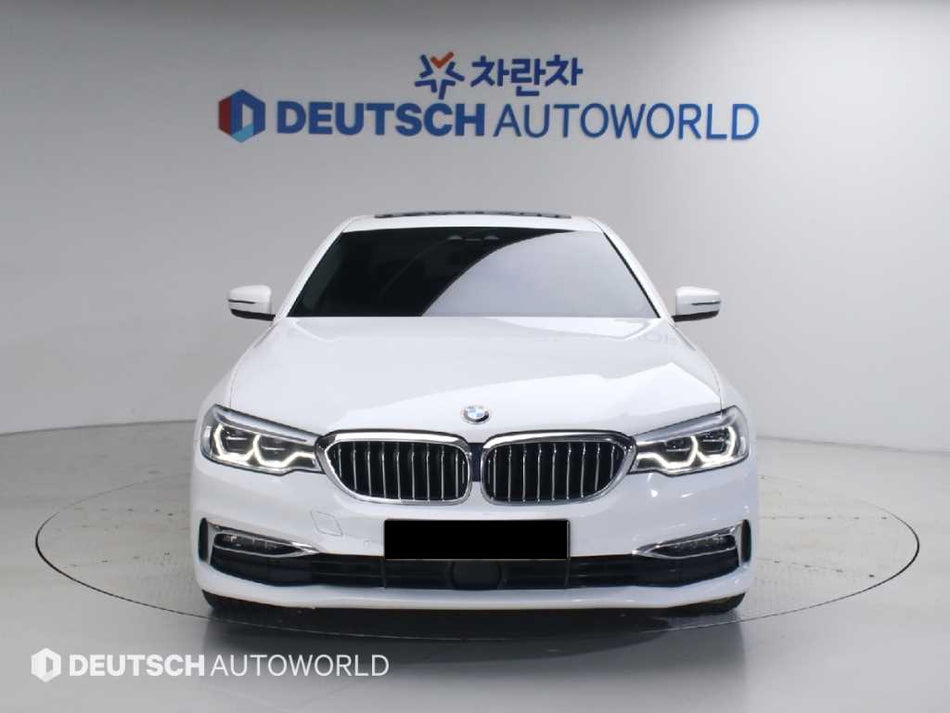 BMW 5-Series — photo 01