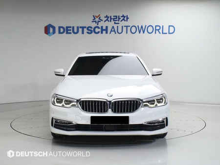BMW 5-Series — photo 01