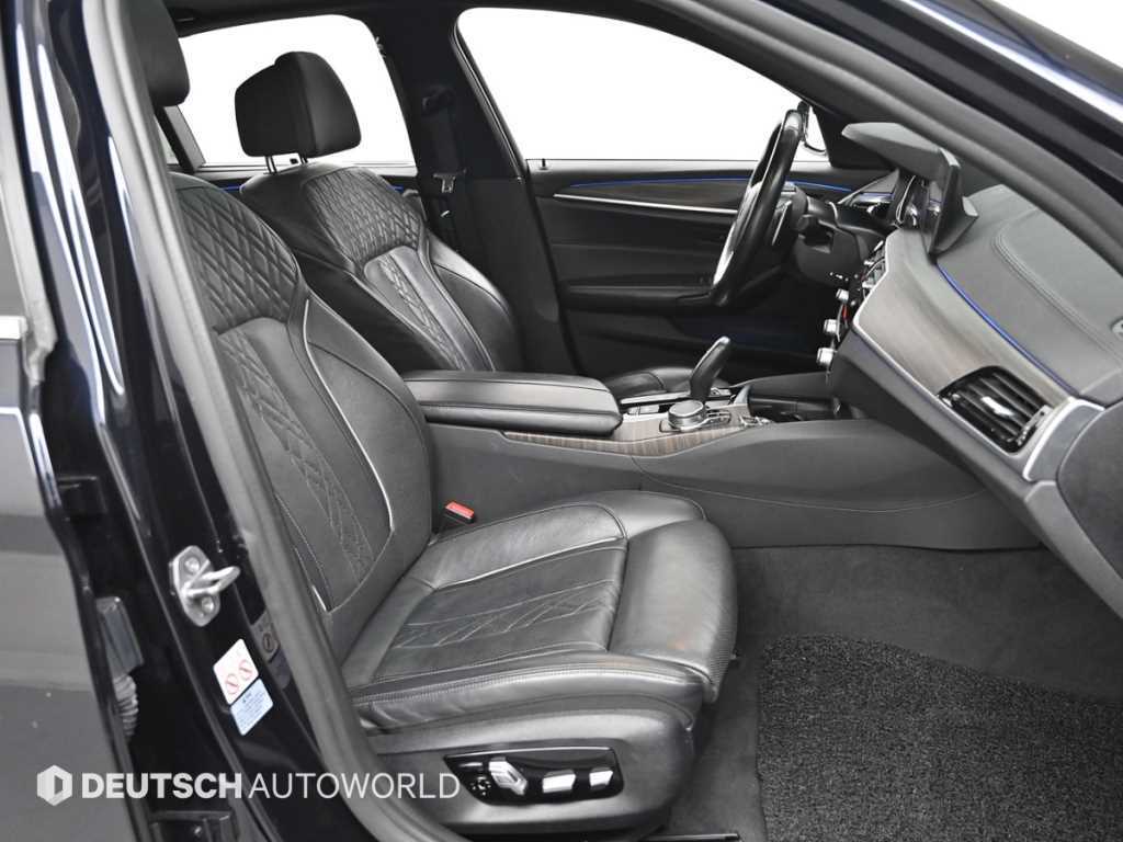 BMW 5-Series — photo 10