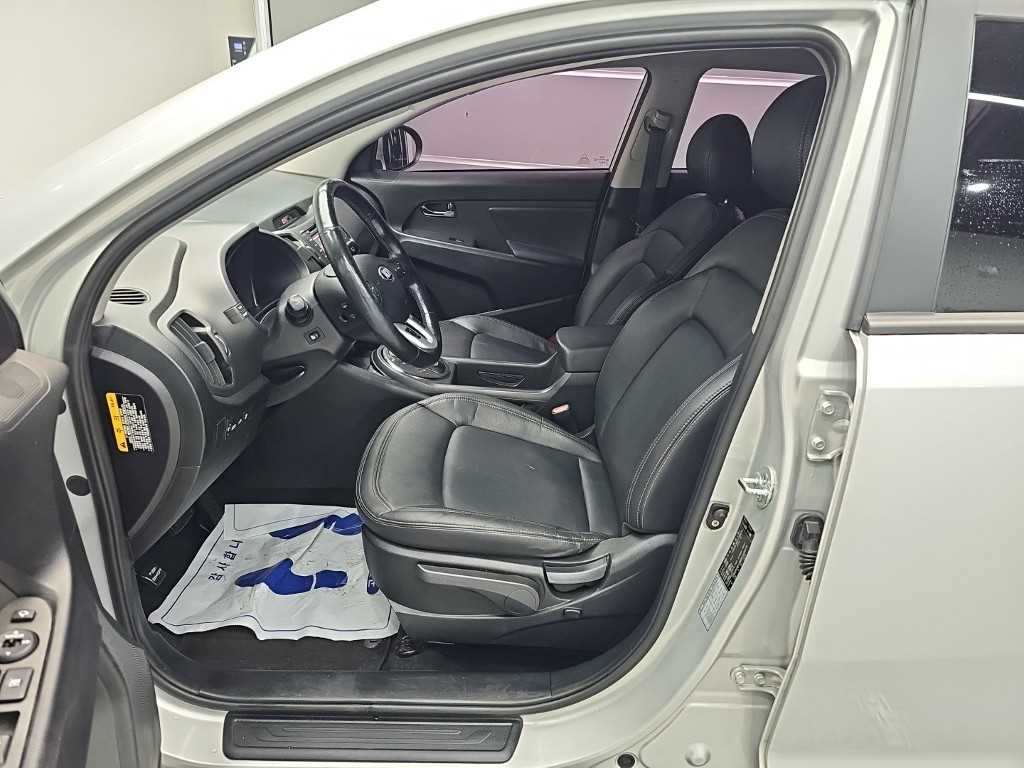 Kia Sportage — photo 11