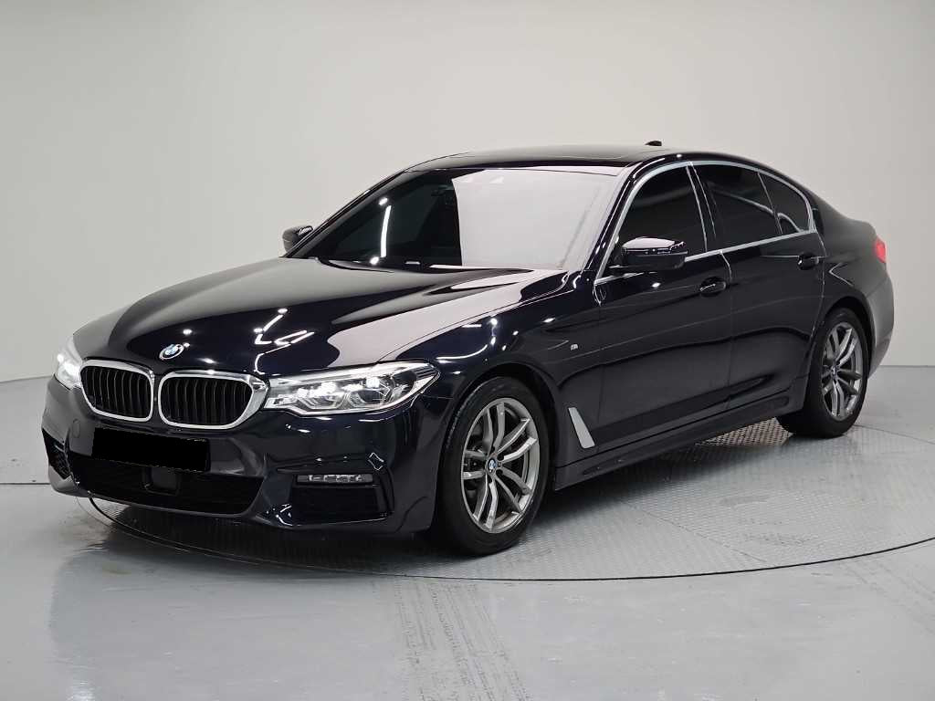 BMW 5-Series — photo 01