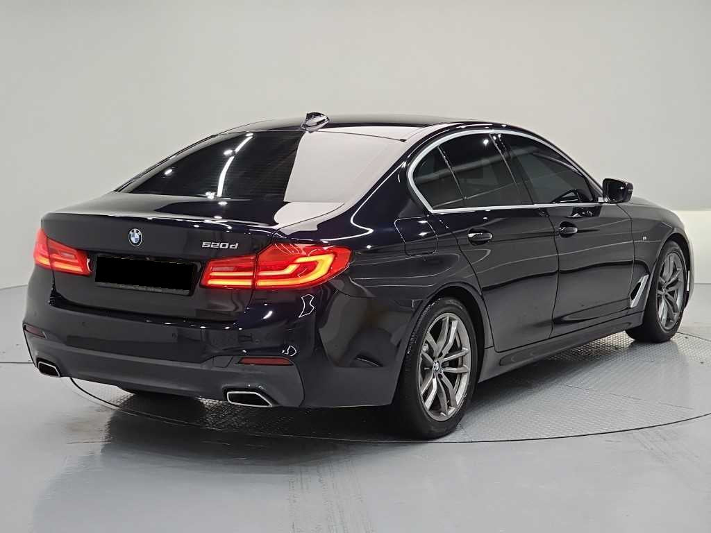 BMW 5-Series — photo 04