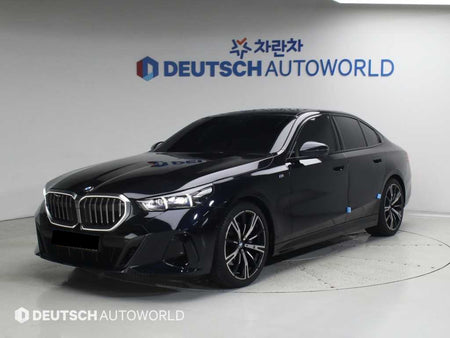 BMW 5-Series — photo 01