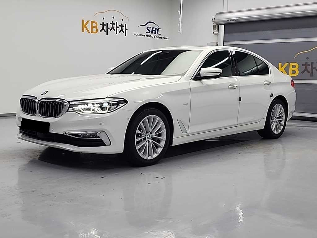 BMW 5-Series — photo 01