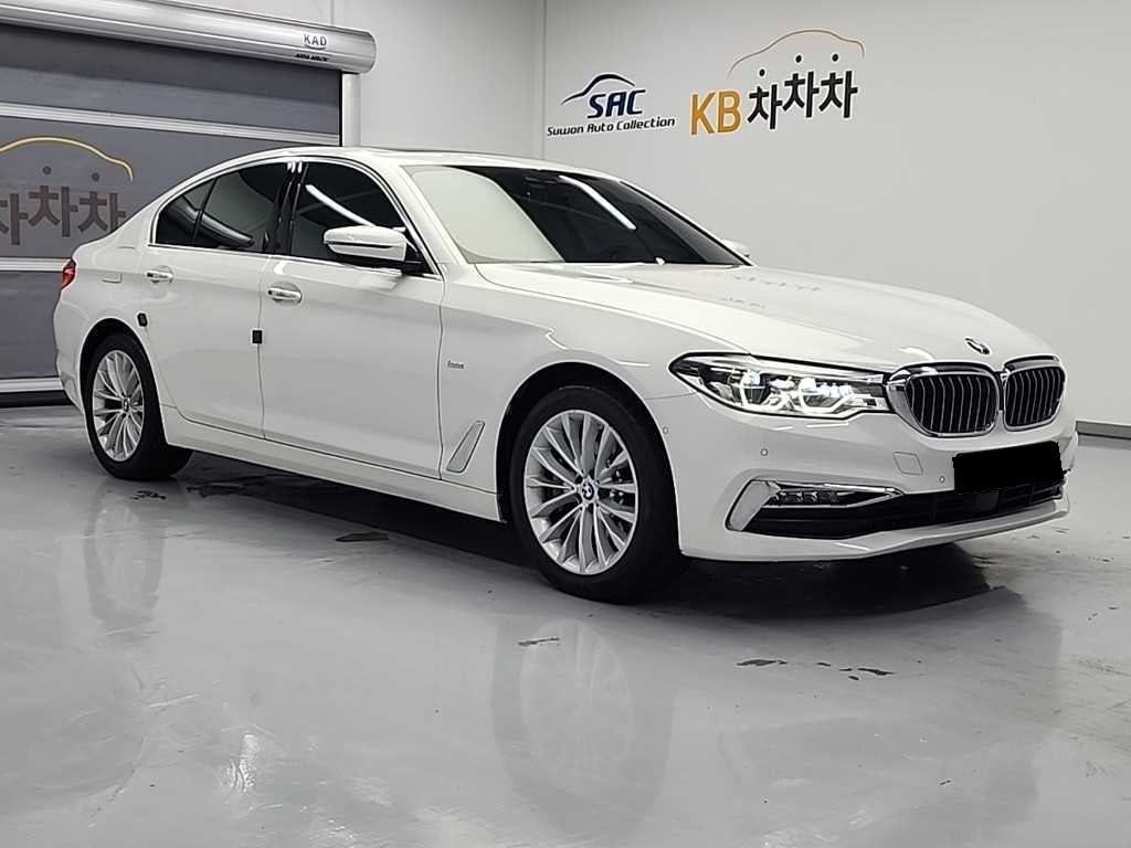 BMW 5-Series — photo 02