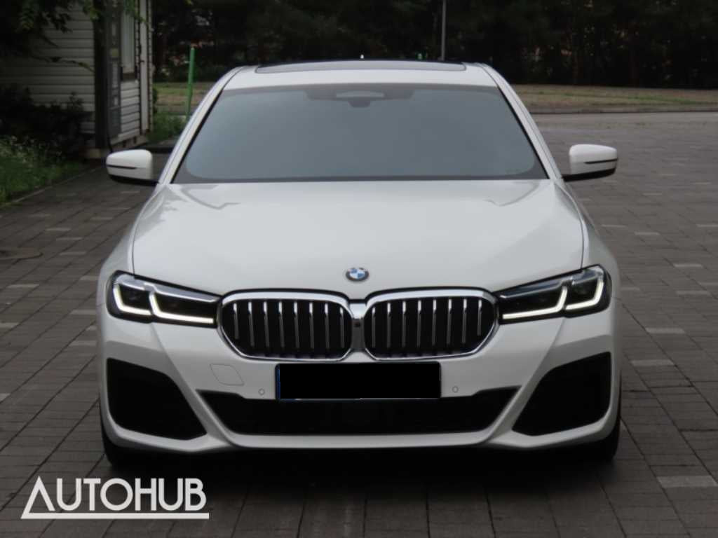 BMW 5-Series — photo 01