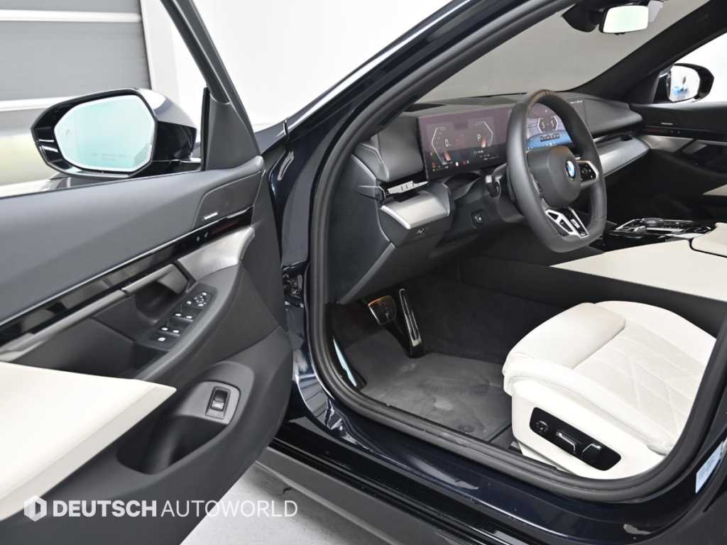 BMW 5-Series — photo 01